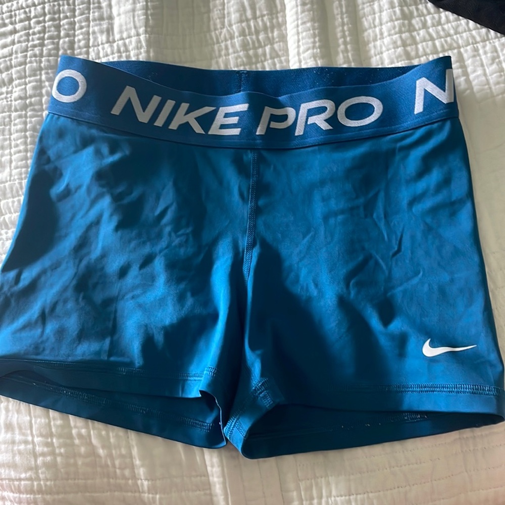 Blue Nike pros